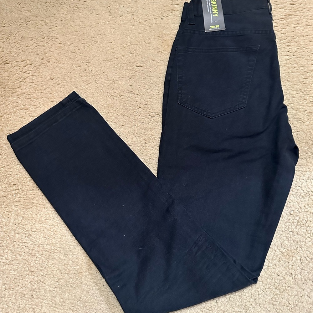 Two pairs of Aeropostale skinny pants- black reflex twill and green chino pant